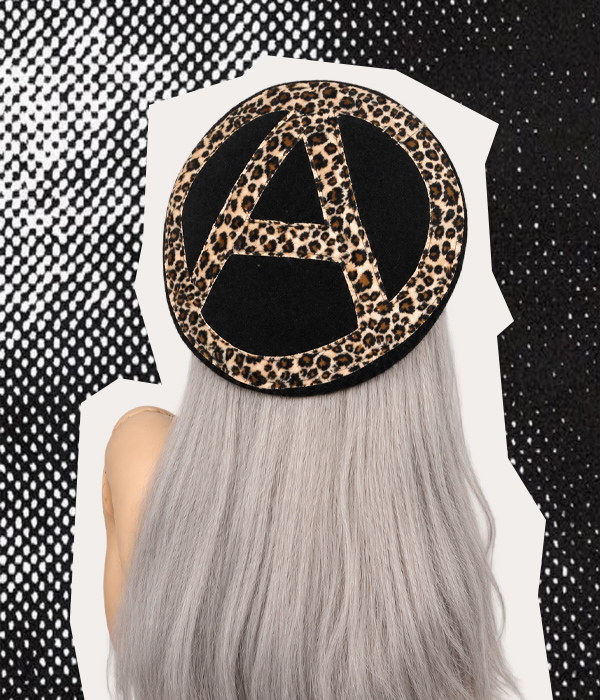 Black handmade punk beret featuring a brown, cream and black leopard-print anarchy symbol