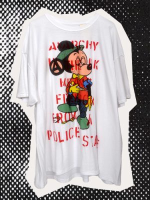 White men's Anarchy Seditionaries style punk T-shirt with colourful cartoon artwork, black anarchist symbol and red hand stencilled lettering, printed inside out.
