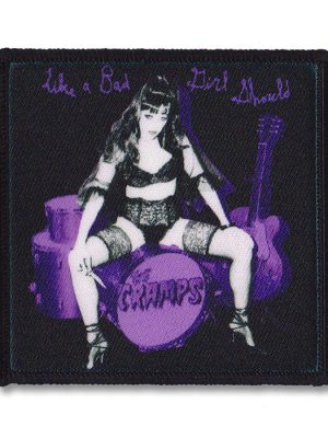 Cramps Bad Girl sew-on patch featuring a vintage pin-up draped over a drum kit in purple and black.