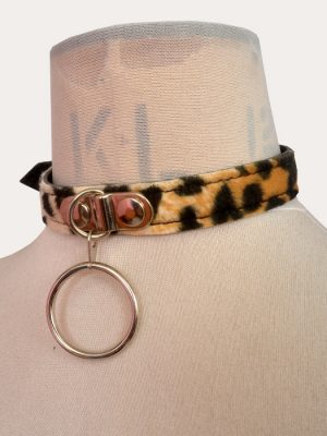 Classic leopard print adjustable punk collar on a mannequin, with silver-tone front O-ring detail and buckle fastening.