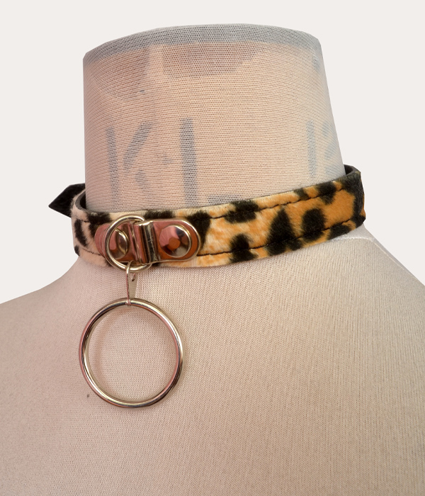 Classic leopard print adjustable punk collar on a mannequin, with silver-tone front O-ring detail and buckle fastening.