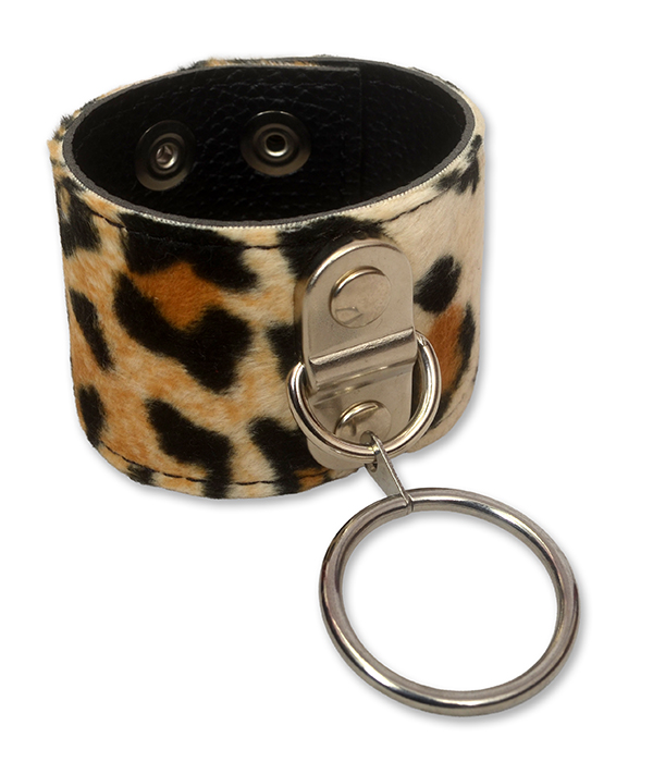 Leopard print O-ring wrist cuff made from faux fur and black PU leather, shown flat and fastened, with adjustable press studs and a large silver metal ring.