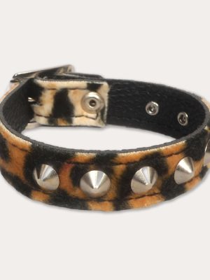 Classic tan, cream and black leopard print punk wrist cuff with a furry finish, silver-tone cone studs and black inner lining.