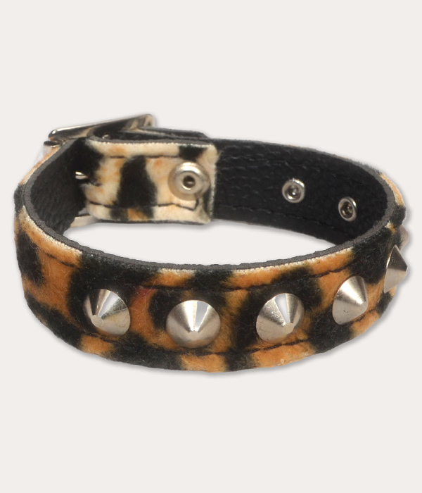 Classic tan, cream and black leopard print punk wrist cuff with a furry finish, silver-tone cone studs and black inner lining.