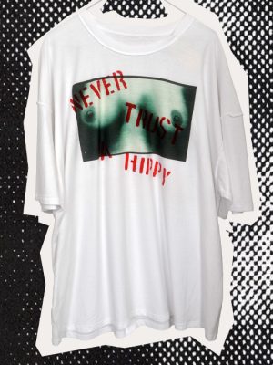 White men's Never Trust a Hippy Seditionaries style punk T-shirt featuring a green photographic print and bold red hand stencilled lettering.