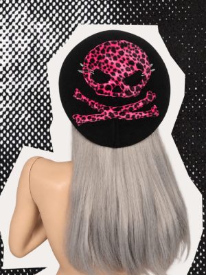 Handmade black gothic punk beret with hot pink and black leopard-print skull and crossbones and silver safety pins