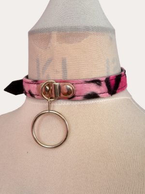 Pink and black leopard print adjustable punk collar on a mannequin, with silver-tone front O-ring detail and buckle fastening.