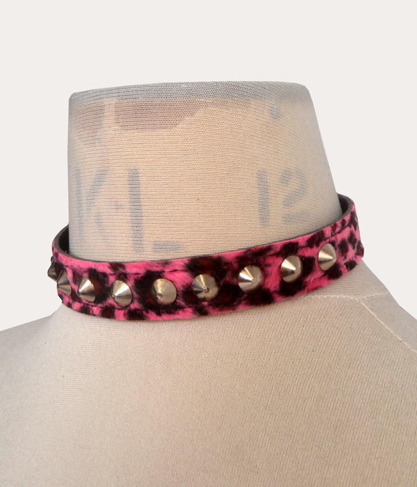 Pink and black leopard print adjustable punk collar with silver-tone cone studs, shown on a mannequin.