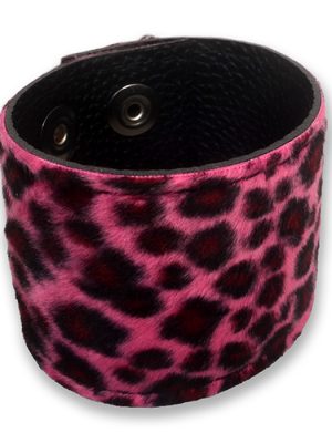 Pink leopard print wrist cuff made from faux fur and black PU leather, shown flat and fastened, with adjustable press stud closure.