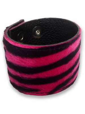 Pink zebra print wrist cuff made from faux fur and black PU leather, shown fastened with adjustable press studs.