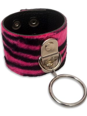 Pink zebra print O-ring wrist cuff made from faux fur and black PU leather, shown fastened with adjustable press studs and a large silver metal ring.