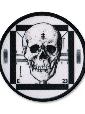 Round Psychic TV sew-on patch featuring black and white skull over a vintage TV test card design.