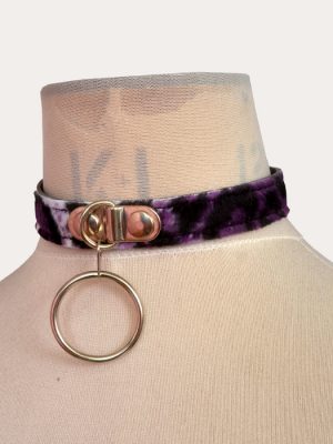 Purple and black leopard print adjustable punk collar on a mannequin, with silver-tone front O-ring detail and buckle fastening.