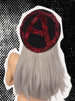 Black punk beret with red leopard print anarchy symbol and silver safety pin details, handmade by Poison Clothing UK.