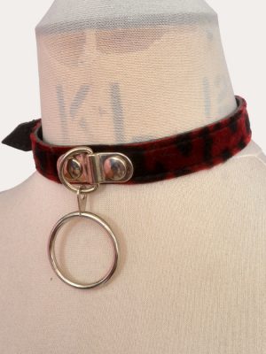 Red and black leopard print adjustable punk collar on a mannequin, with silver-tone buckle fastening and large front O-ring detail.