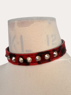 Red and black leopard print adjustable punk collar with silver-tone cone studs, shown on a mannequin and laid flat with buckle fastening.