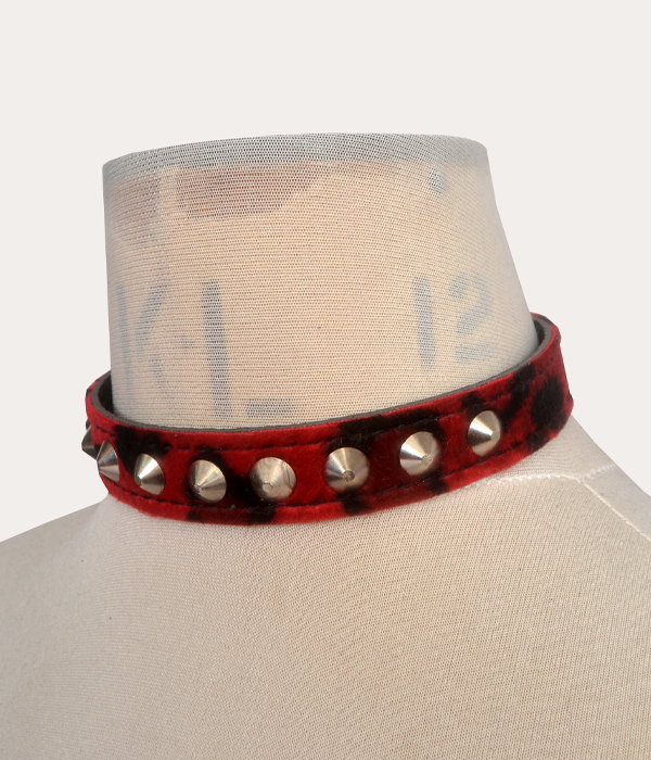 Red and black leopard print adjustable punk collar with silver-tone cone studs, shown on a mannequin and laid flat with buckle fastening.