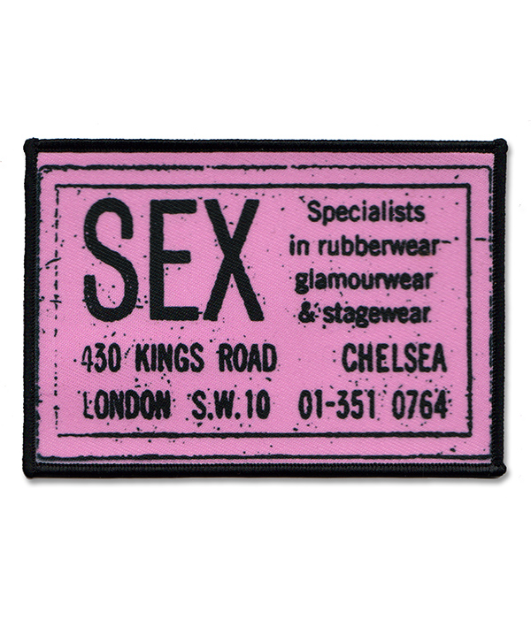 Pink and black rectangular punk sew-on patch featuring large SEX lettering, 430 King’s Road Chelsea address and vintage shop advert styling.