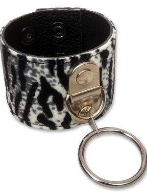 Snow leopard O-ring wrist cuff made from faux fur and black PU leather, shown flat and fastened, with adjustable press studs and a large silver metal ring.