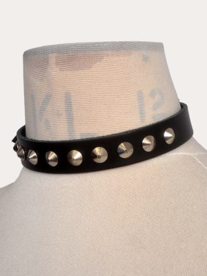 Black real leather adjustable punk collar with silver-tone cone studs, shown on a mannequin and laid flat with buckle fastening.