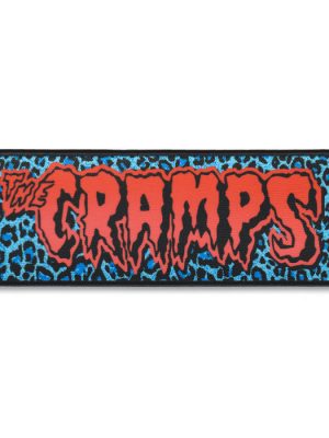 The Cramps sew-on patch with red logo over blue leopard print background.