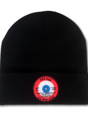 Black knitted beanie hat with folded cuff featuring a circular red, white and blue The Jam All Mod Cons vinyl record label patch.