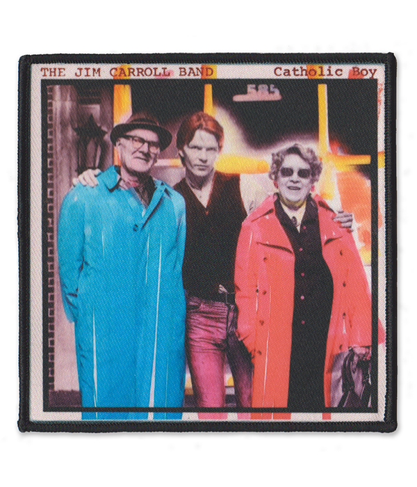 Rectangular The Jim Carroll Band Catholic Boy sew-on patch featuring the album cover photograph of three figures, including bright blue and red coats, with a black overlocked border.
