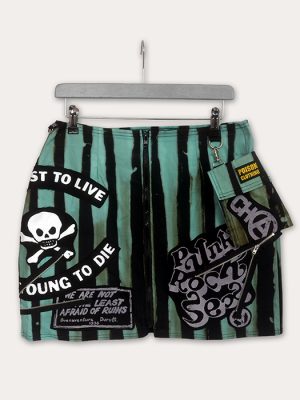 A turquoise and black striped punk mini skirt with skull patches, Seditionaries-style graphics, bold slogans, zips, and a detachable pocket made by Poison Clothing in the UK.