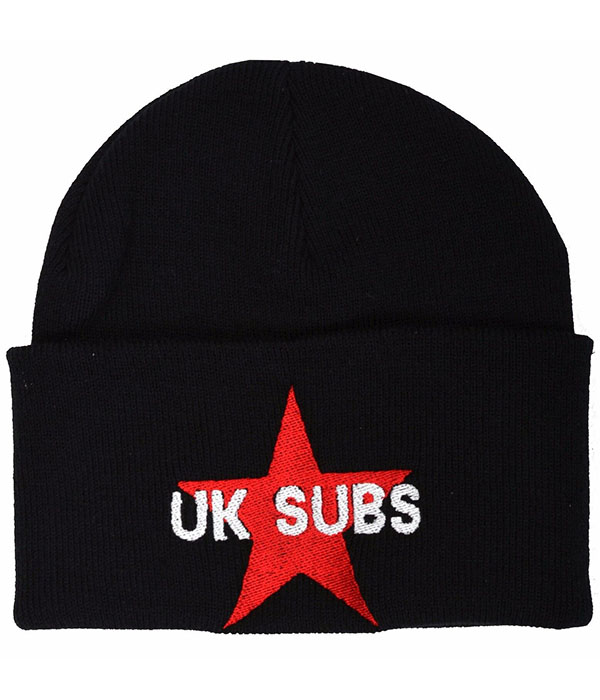 Black knitted punk beanie hat with wide folded cuff featuring a large red embroidered five-pointed star and white UK Subs band lettering across the centre.