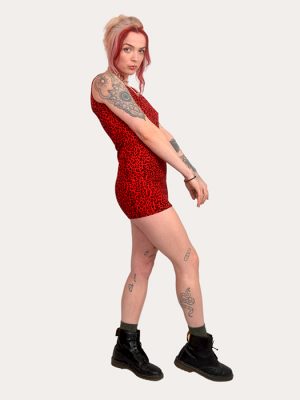 Model wearing a fitted sleeveless red leopard print mini dress from Poison Clothing, made in the UK.