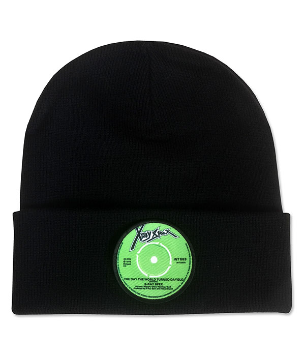 Black cuffed beanie hat featuring bright green X-Ray Spex record style logo patch on the front.